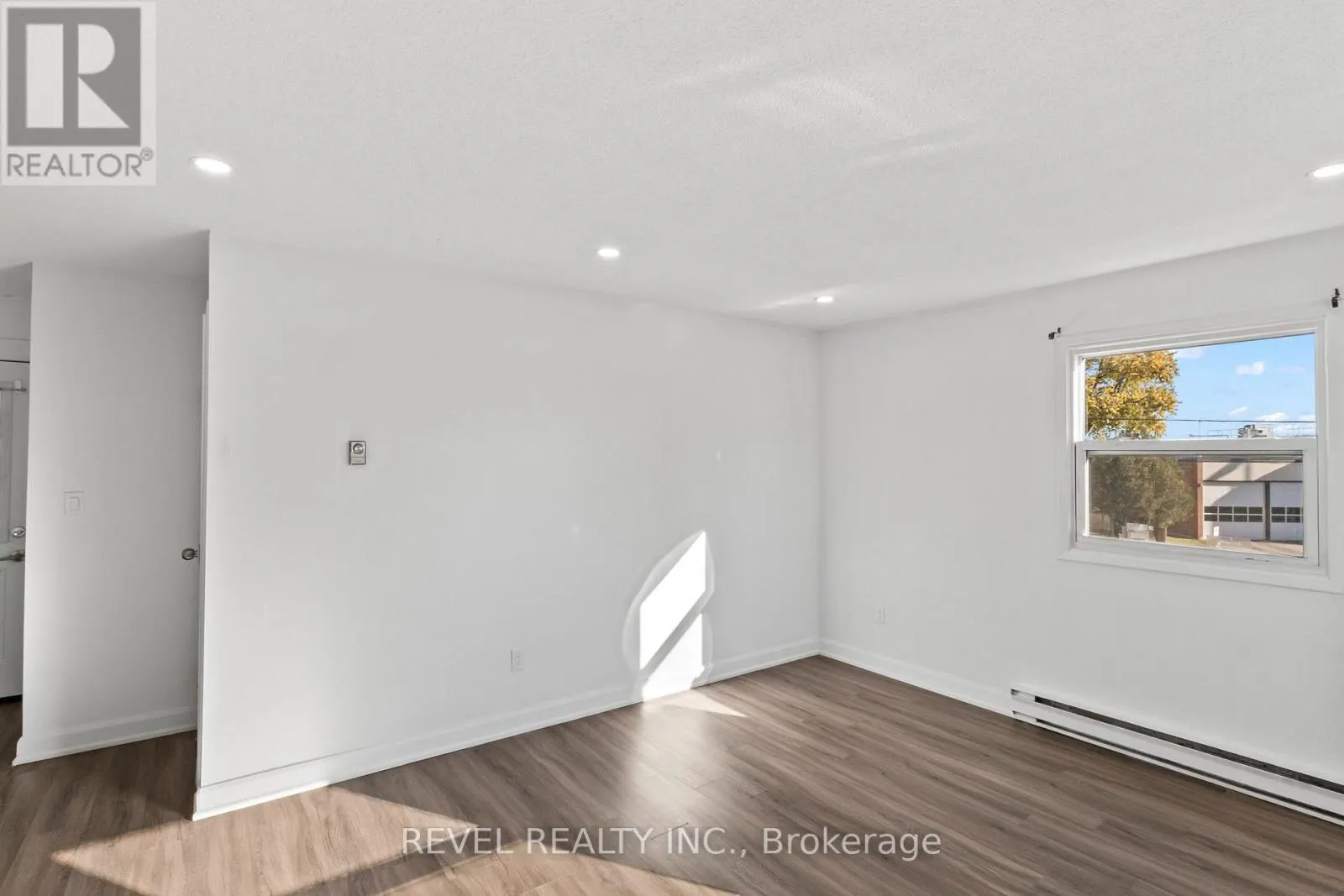 UNIT 2 - 1100 SIMCOE STREET S