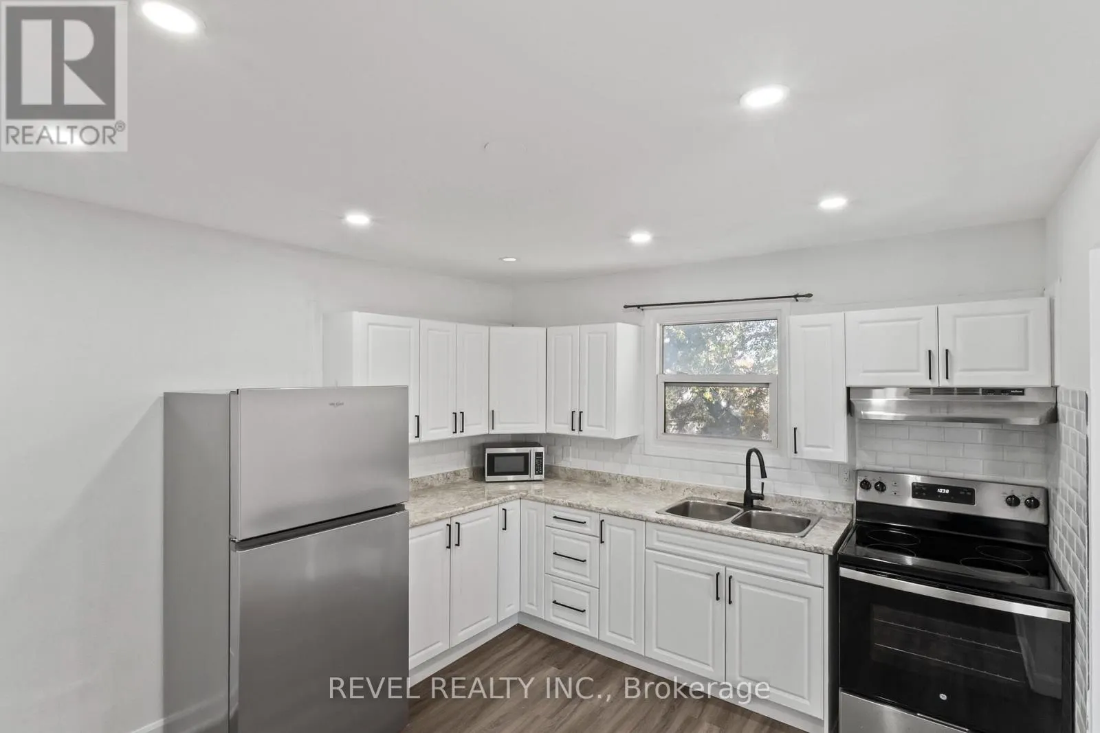 UNIT 2 - 1100 SIMCOE STREET S