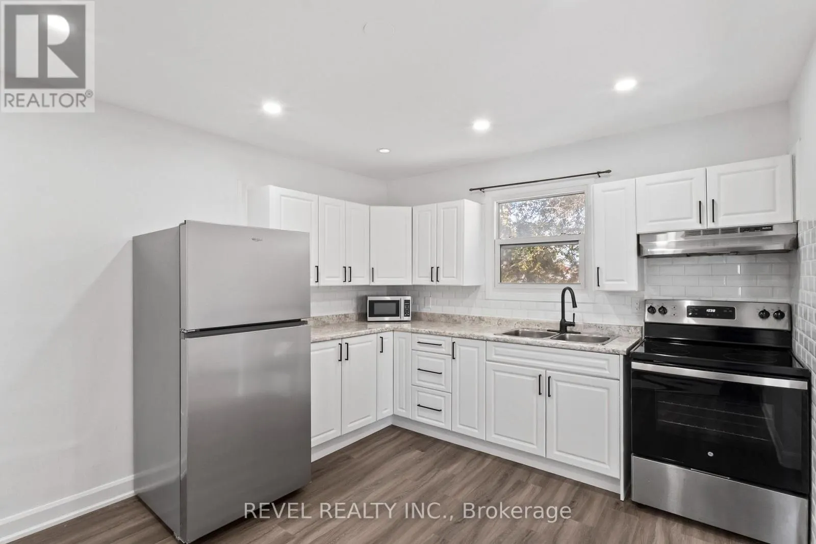 UNIT 2 - 1100 SIMCOE STREET S