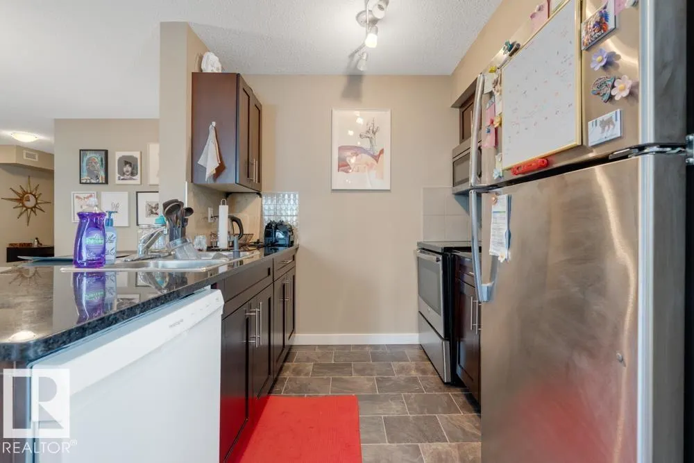 #102 5816 MULLEN PL NW