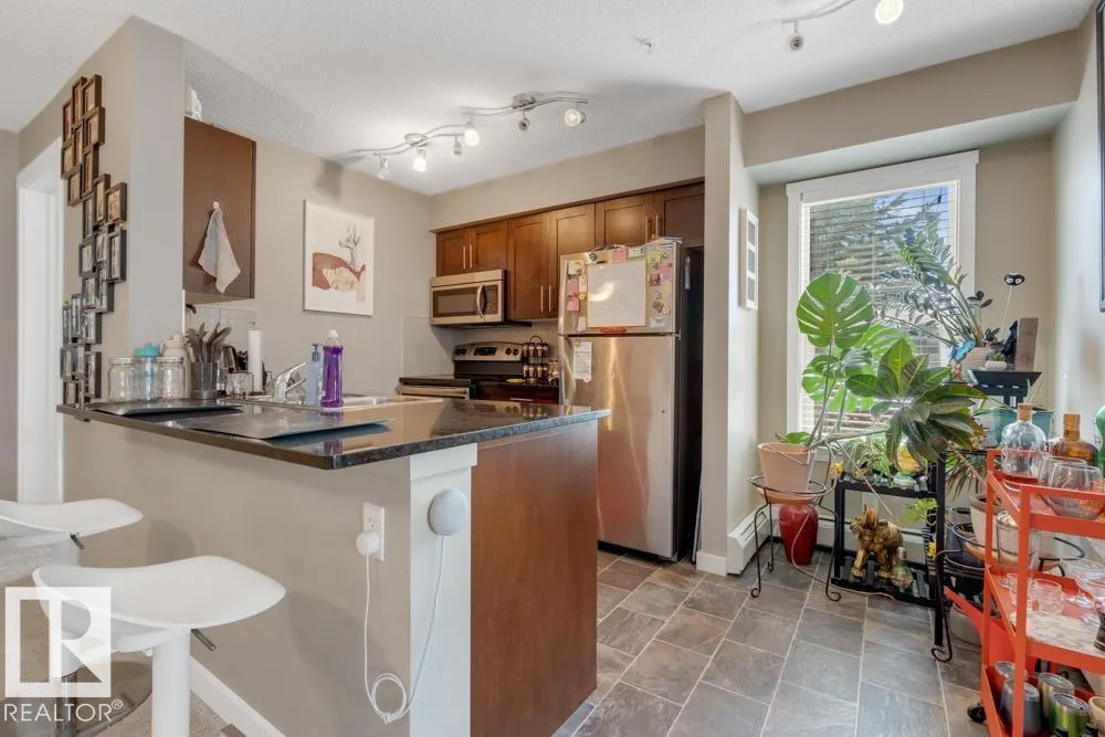 #102 5816 MULLEN PL NW