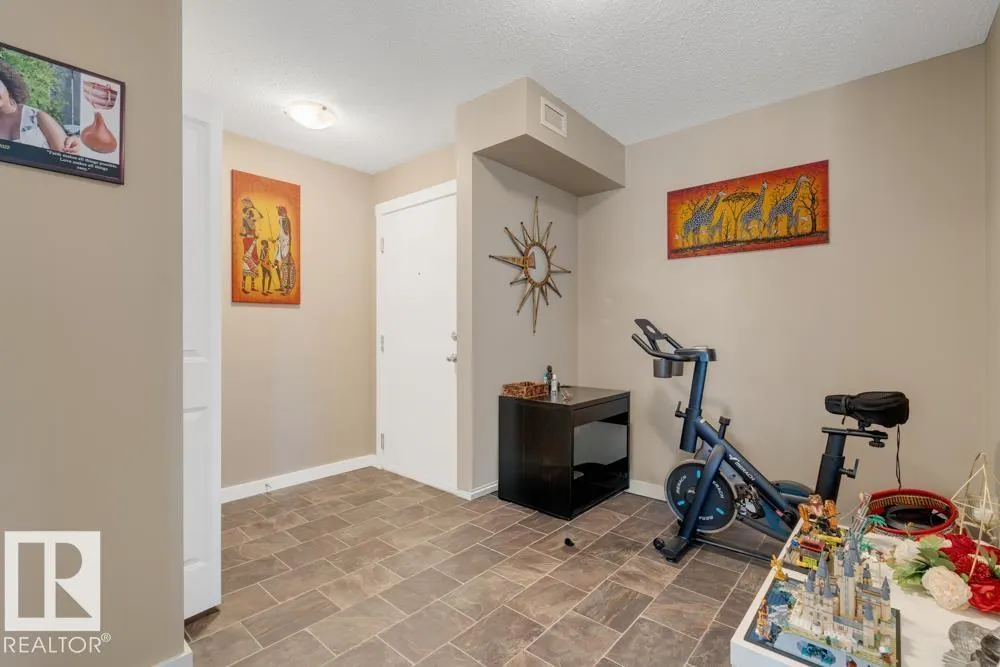 #102 5816 MULLEN PL NW