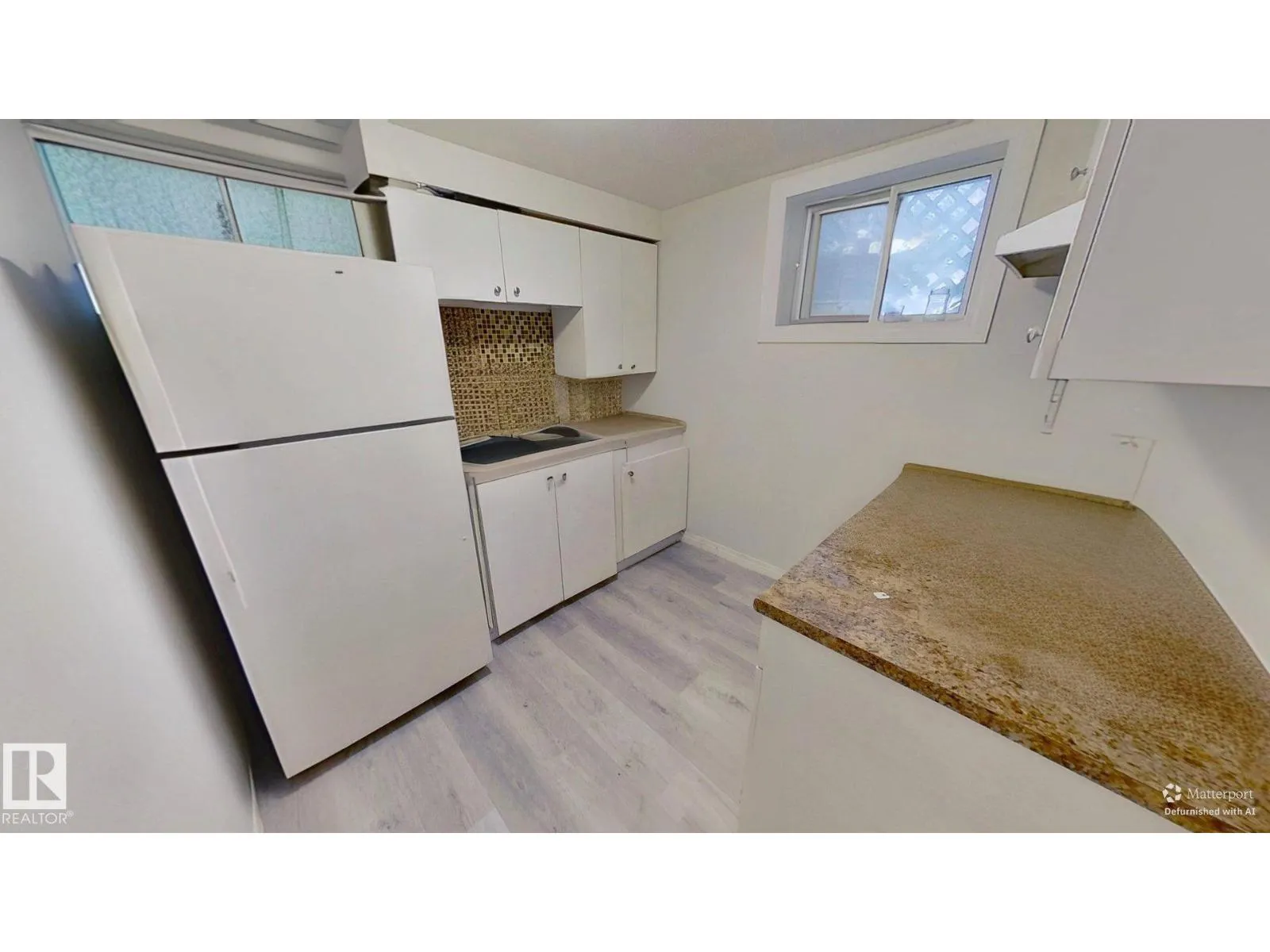 10627 76 AV NW