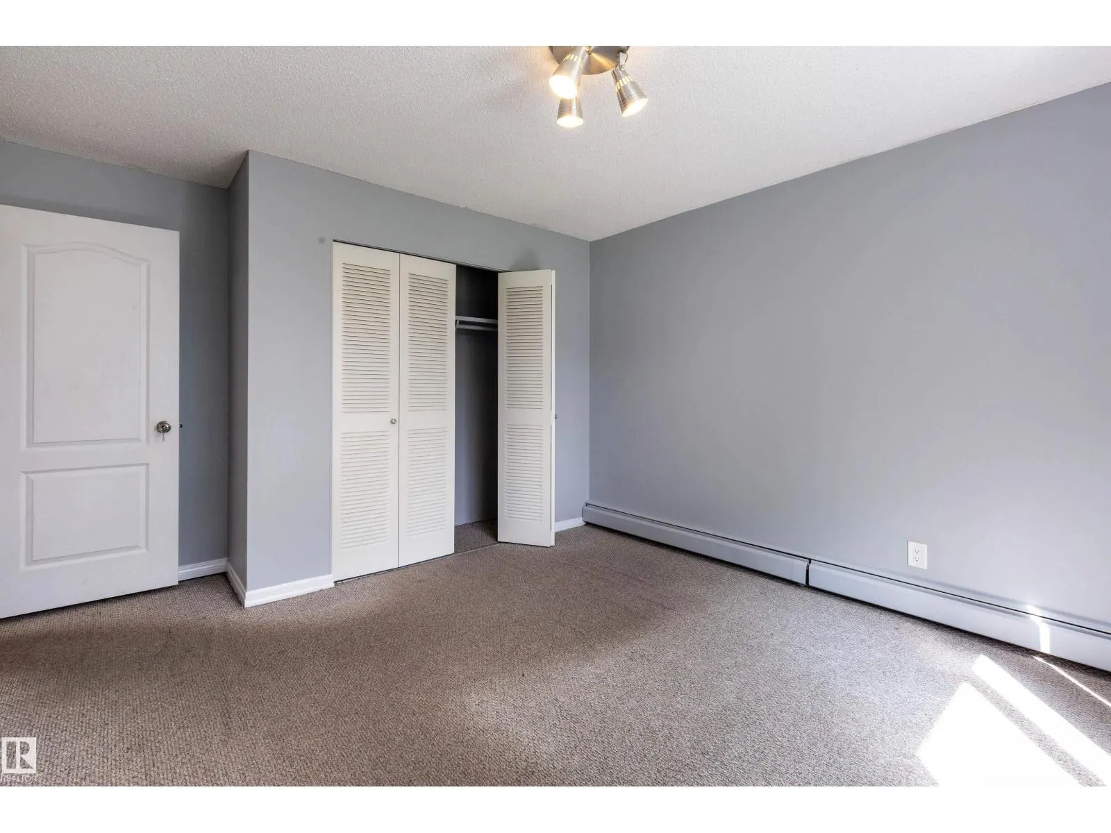 #202 10740 105 ST NW