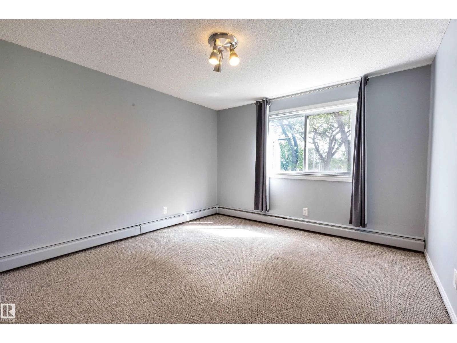#202 10740 105 ST NW