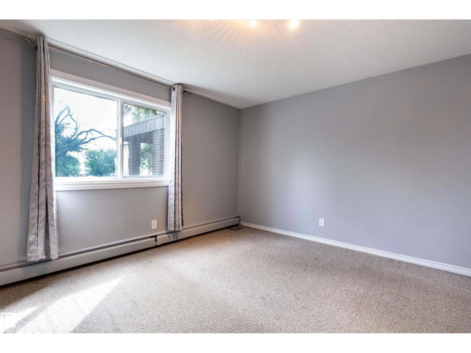 #202 10740 105 ST NW