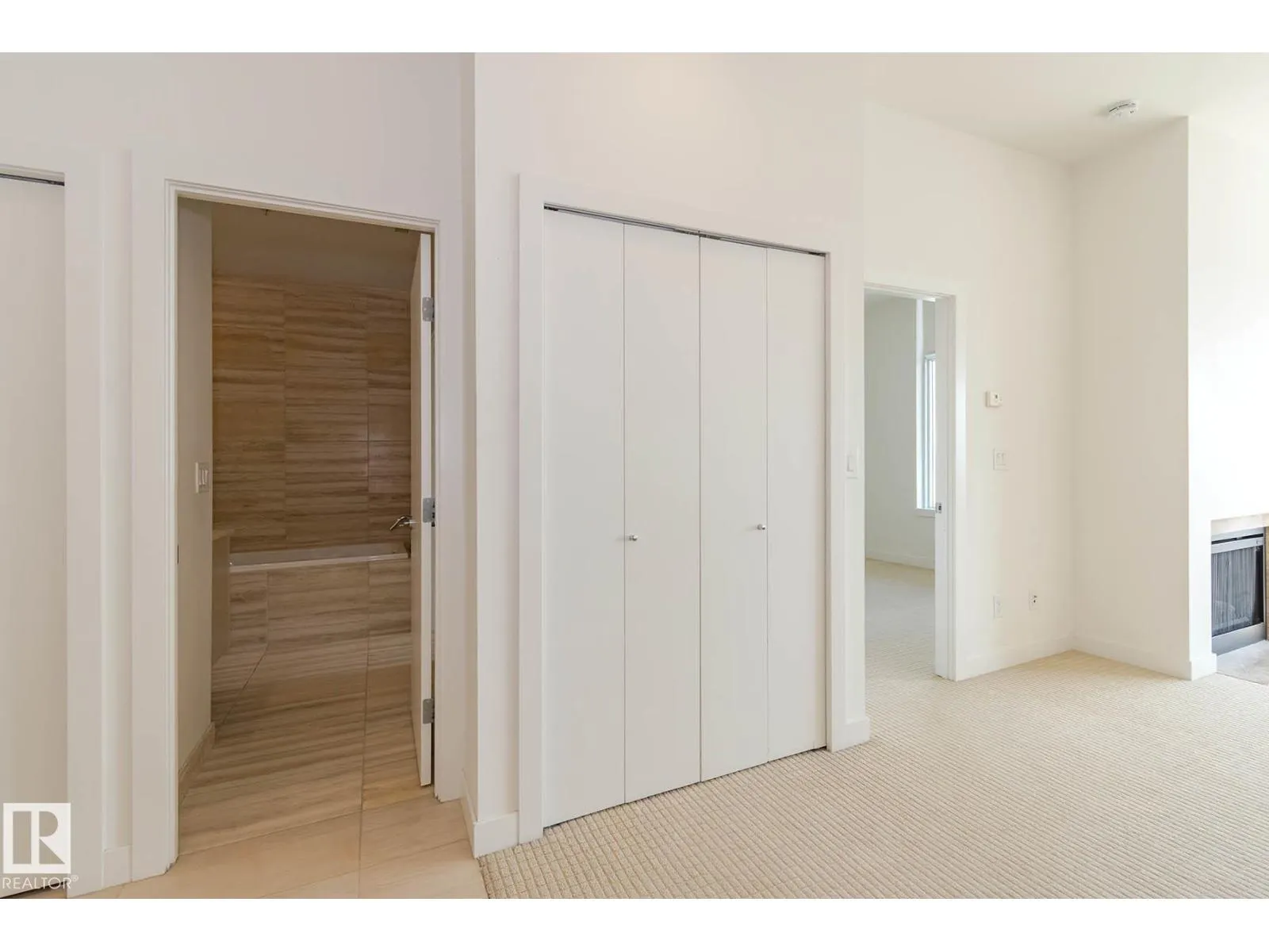 #703 2504 109 ST NW