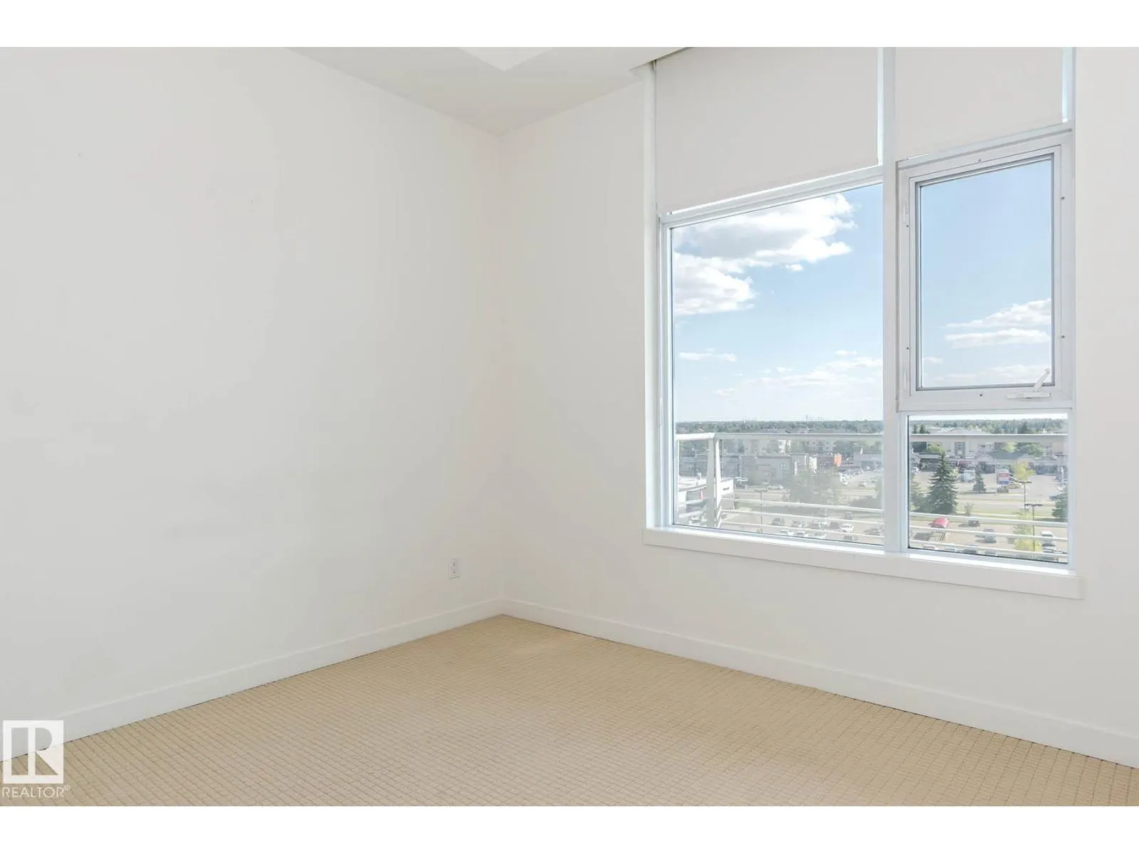 #703 2504 109 ST NW