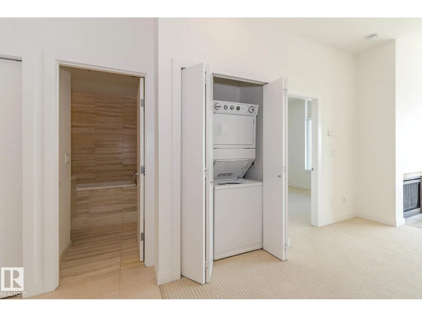 #703 2504 109 ST NW