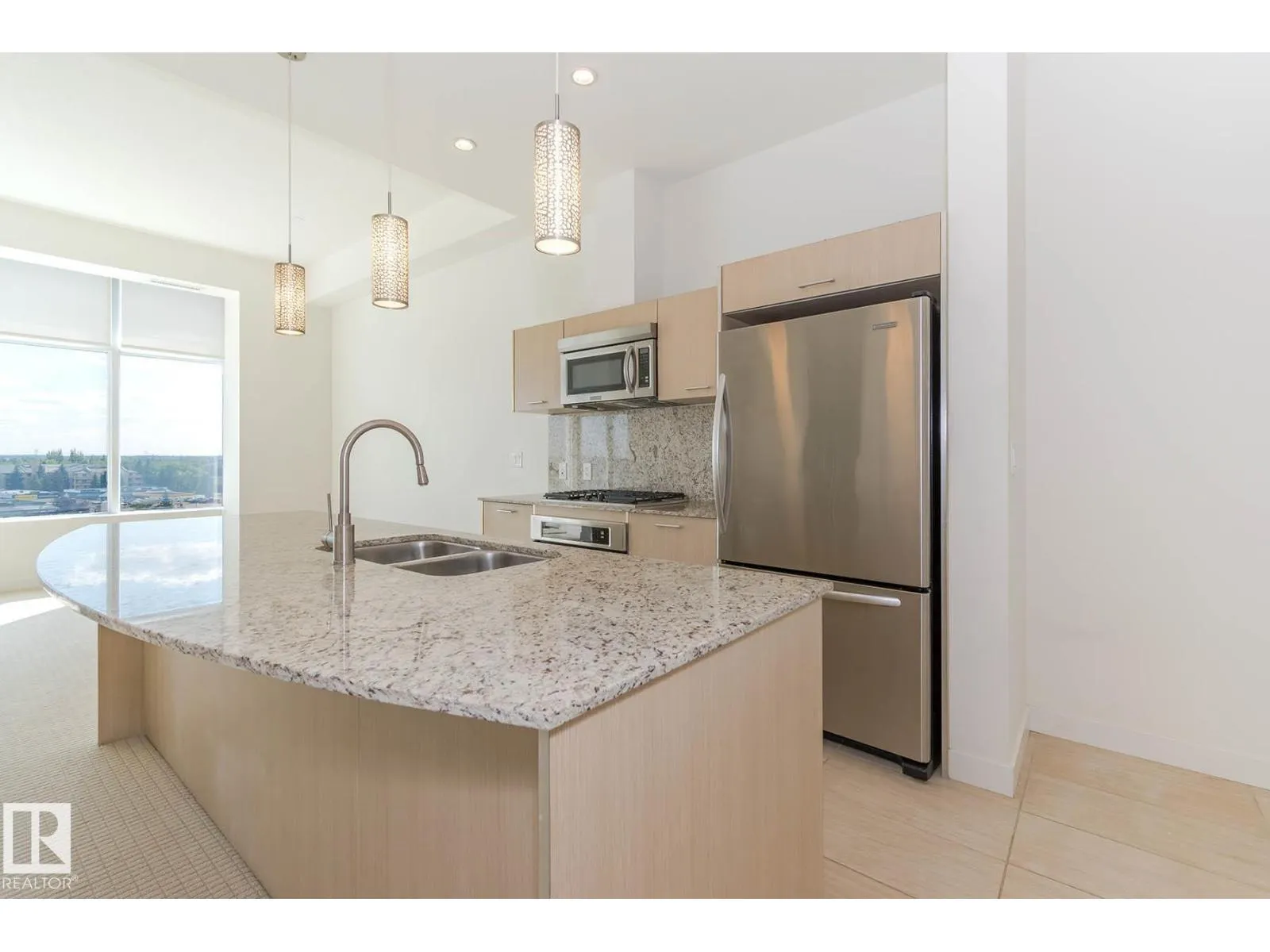 #703 2504 109 ST NW