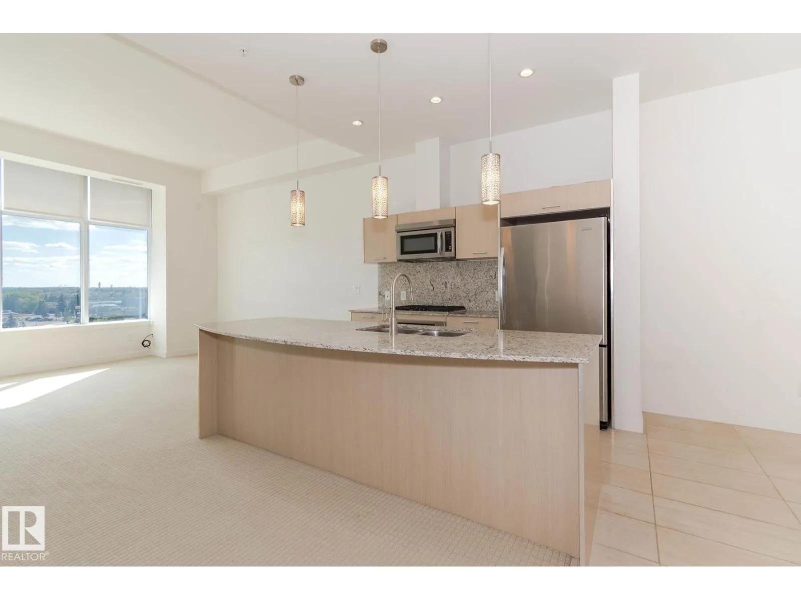 #703 2504 109 ST NW