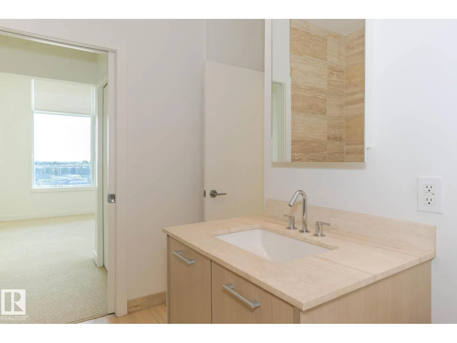 #703 2504 109 ST NW