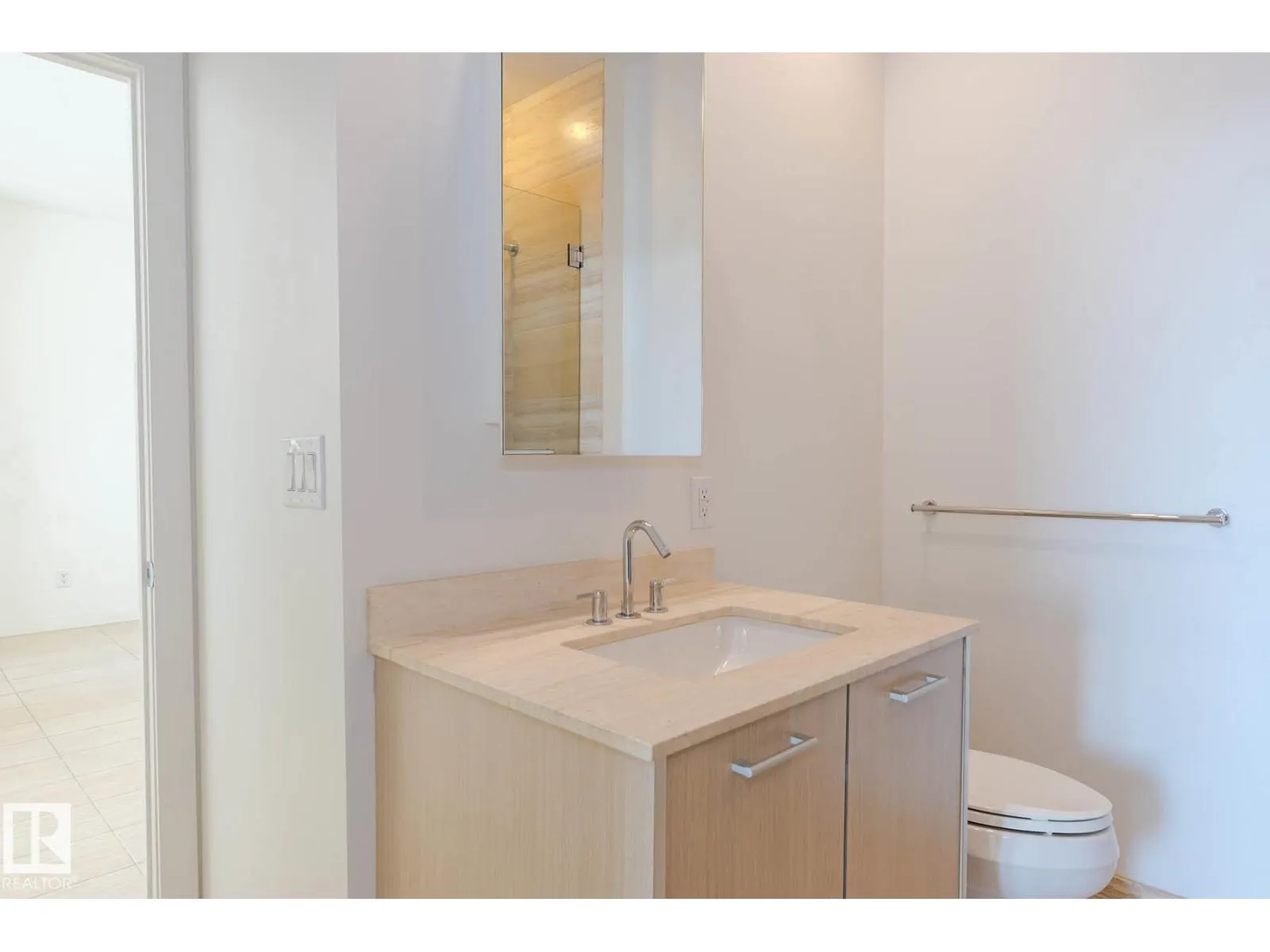 #703 2504 109 ST NW