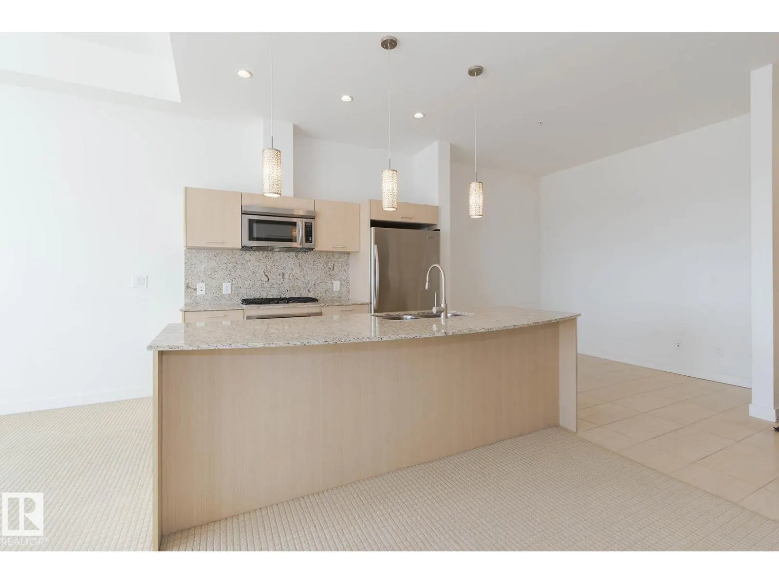 #703 2504 109 ST NW