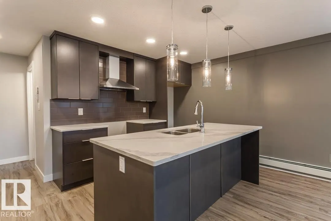 #101 10736 116 ST NW NW