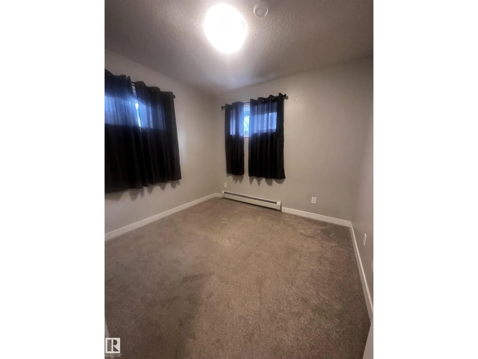 #103 10736 116 ST NW