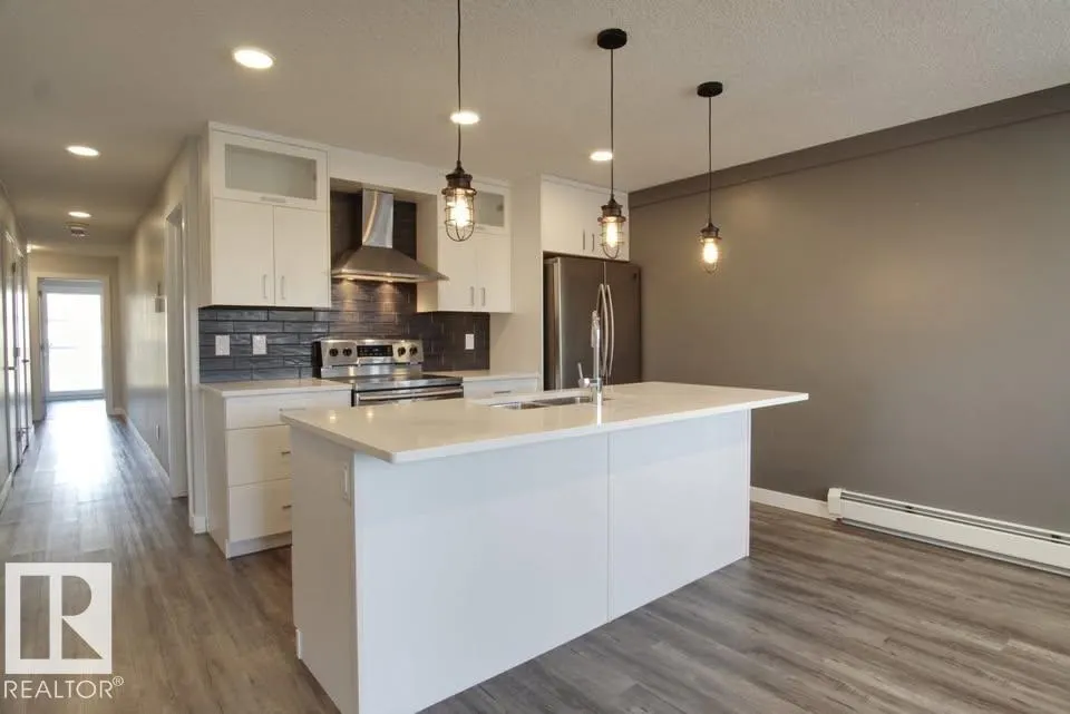 #202 10736 116 ST NW