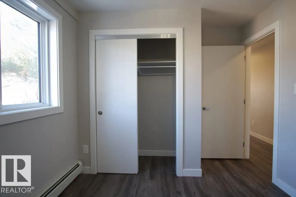 #202 10736 116 ST NW