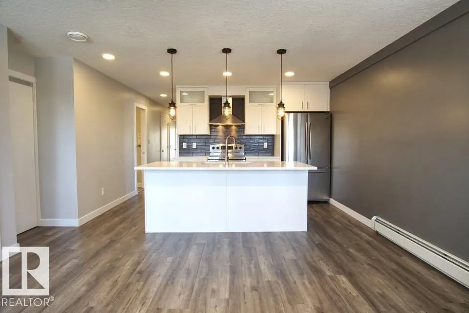 #202 10736 116 ST NW