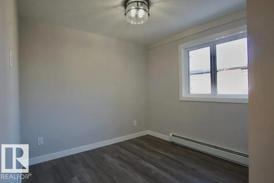 #202 10736 116 ST NW
