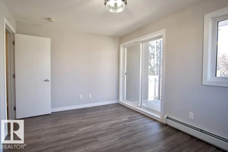 #202 10736 116 ST NW