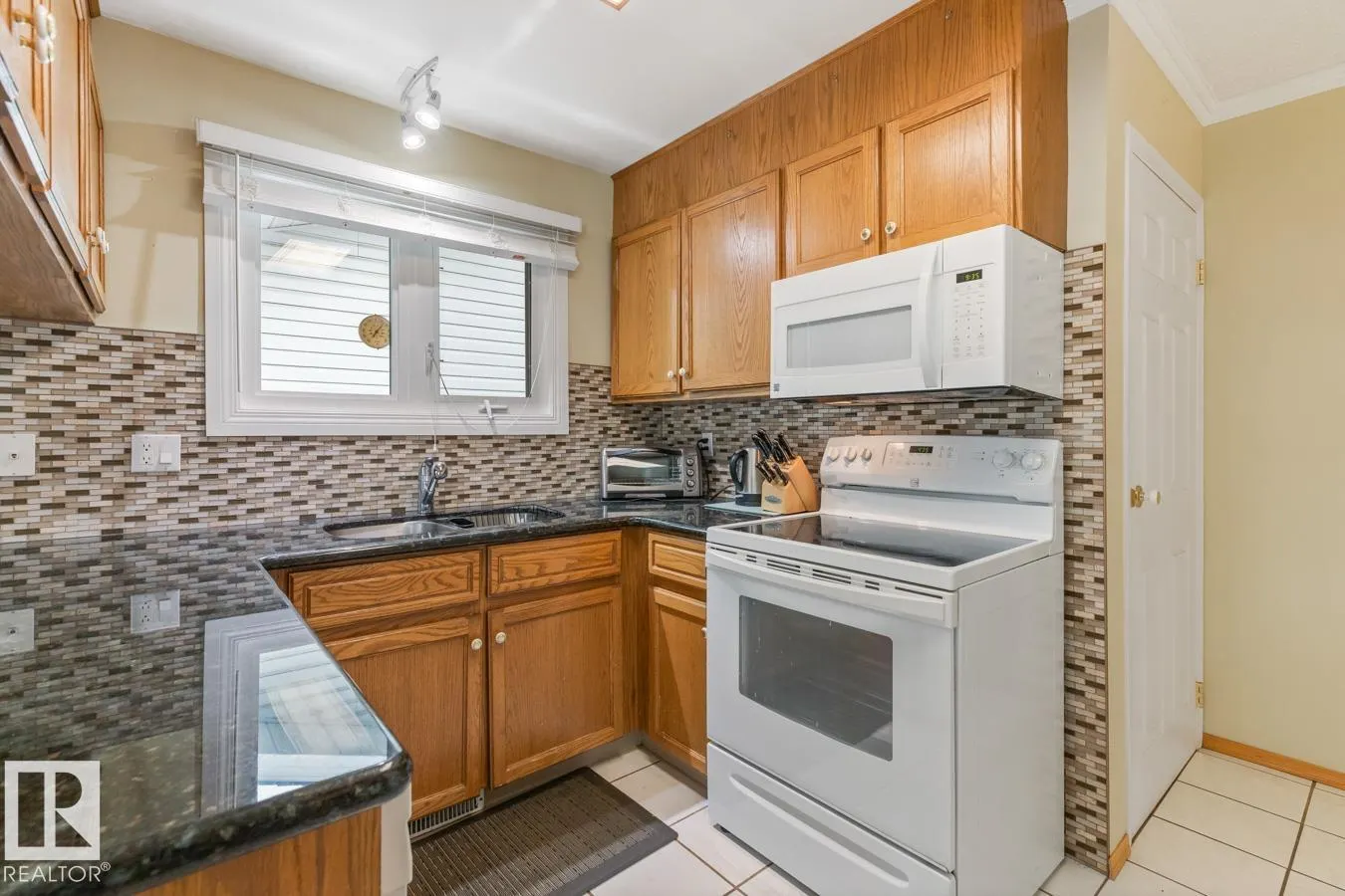 5116 14 AV NW