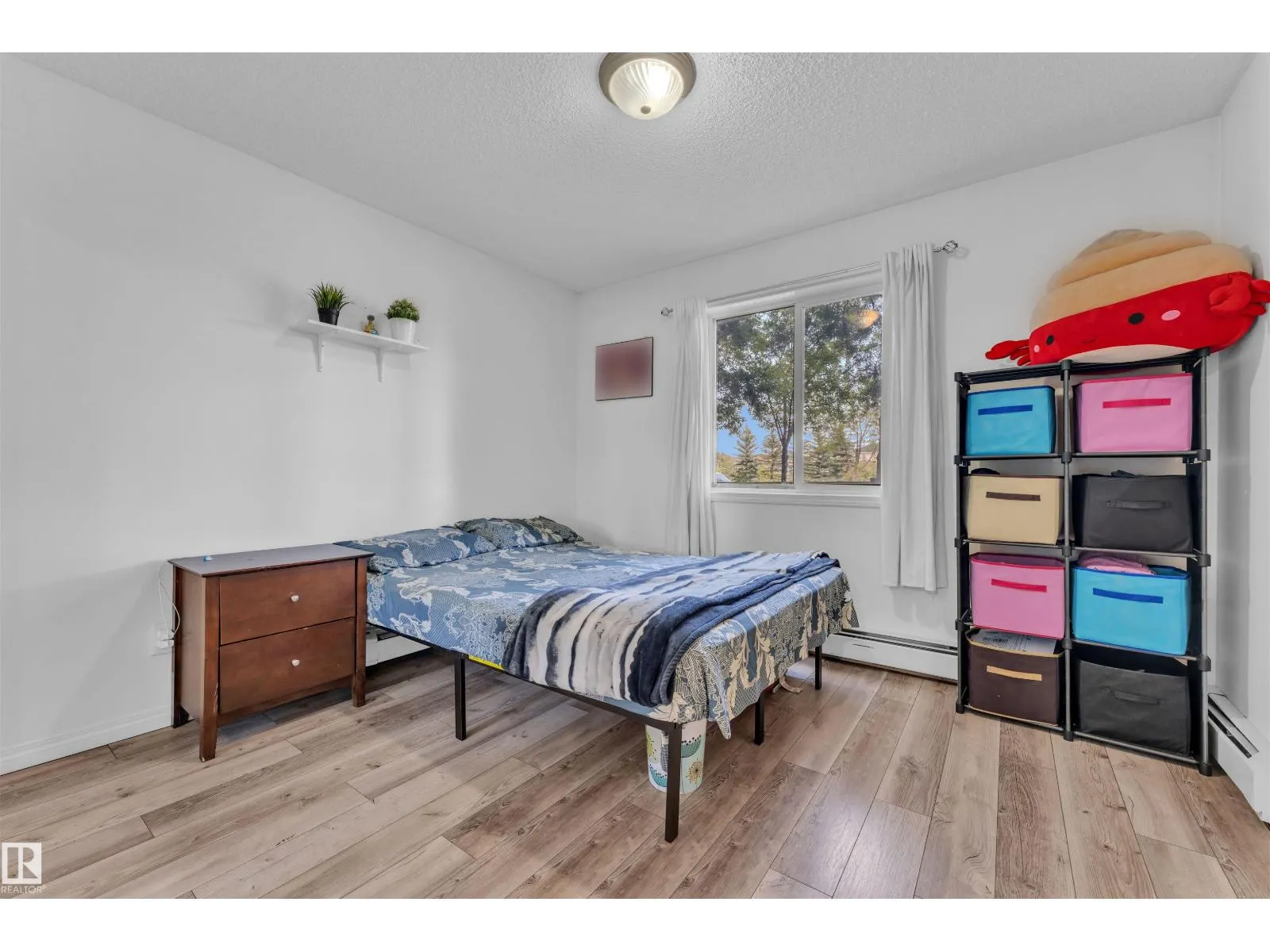 #122 245 EDWARDS DR SW