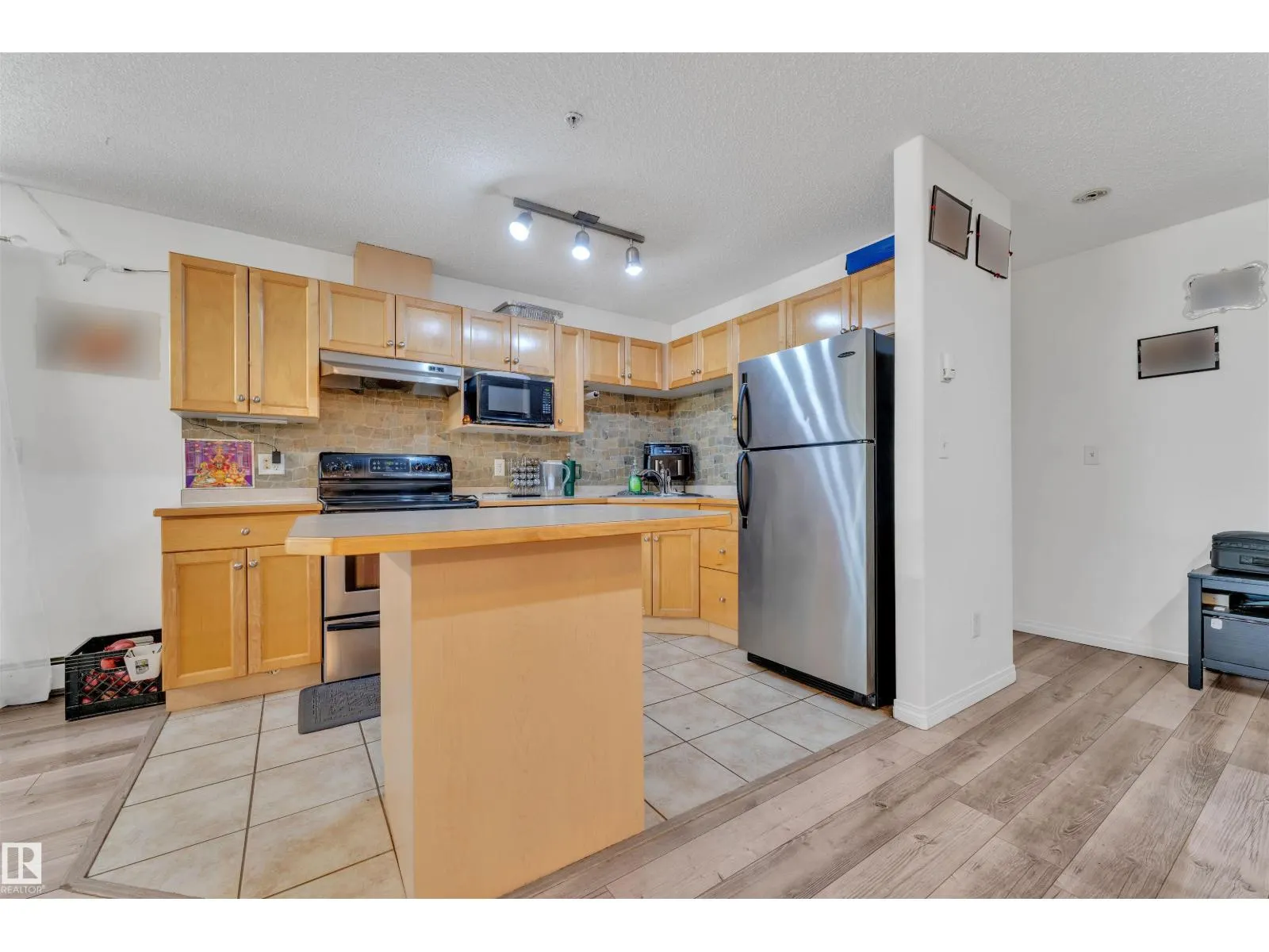 #122 245 EDWARDS DR SW
