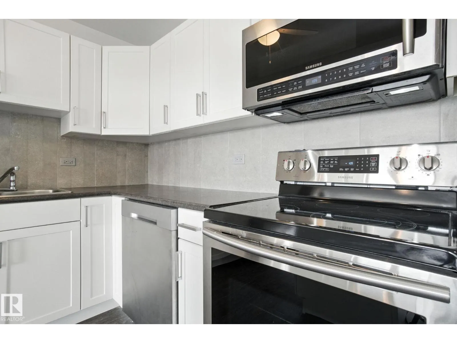 #703 9908 114 ST NW