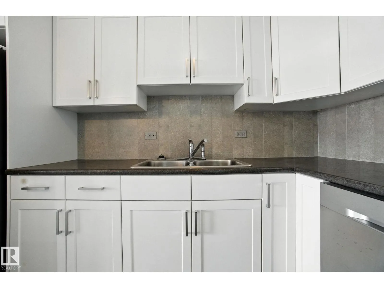#703 9908 114 ST NW