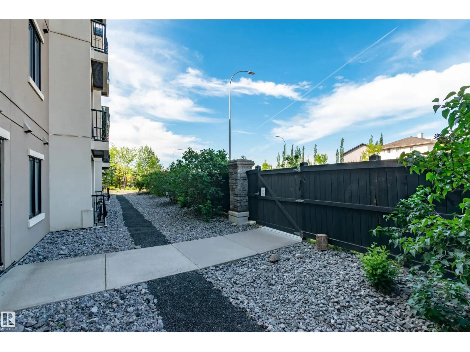 #140 6079 MAYNARD WY NW