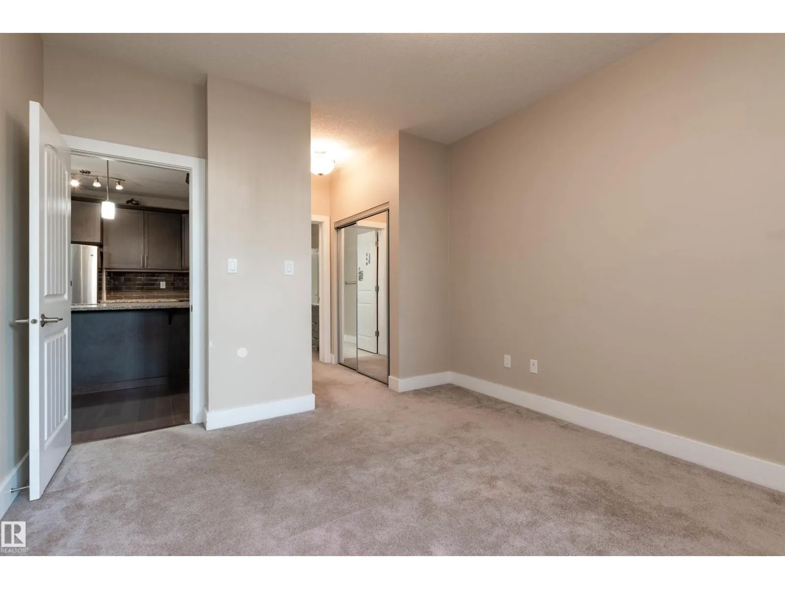 #140 6079 MAYNARD WY NW