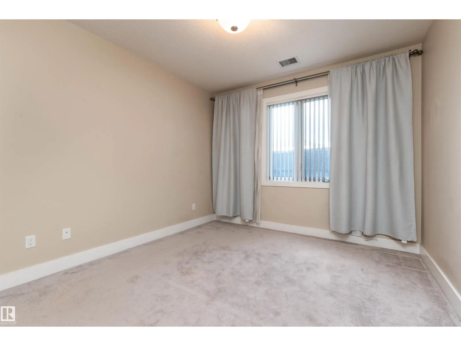 #140 6079 MAYNARD WY NW