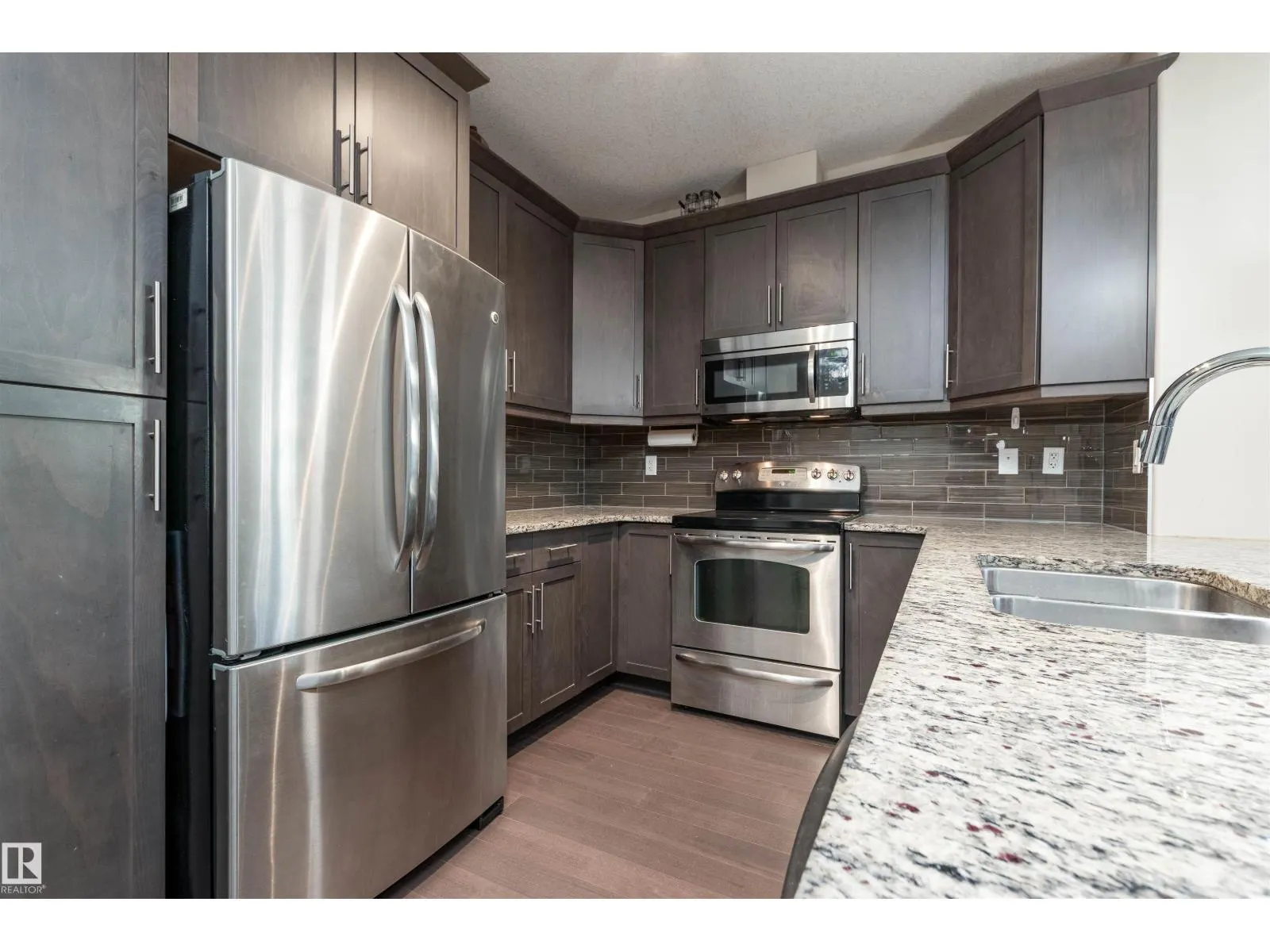 #140 6079 MAYNARD WY NW