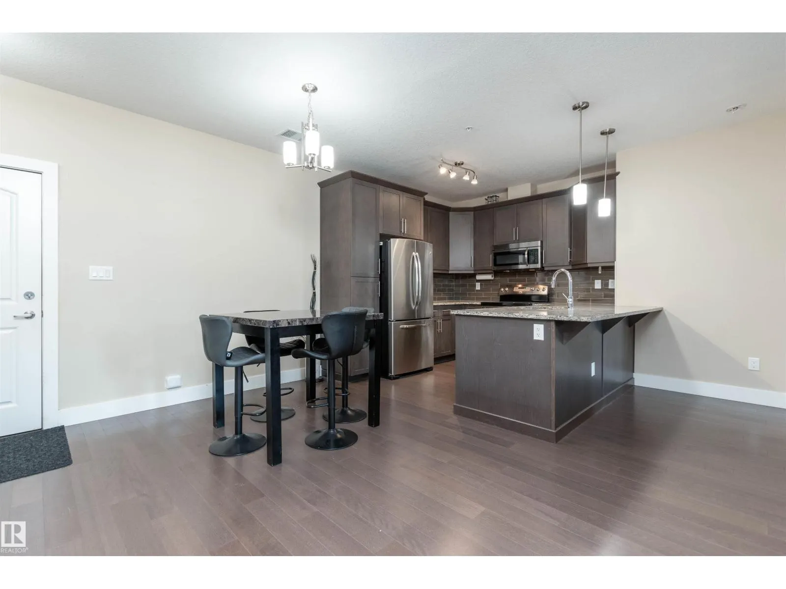 #140 6079 MAYNARD WY NW