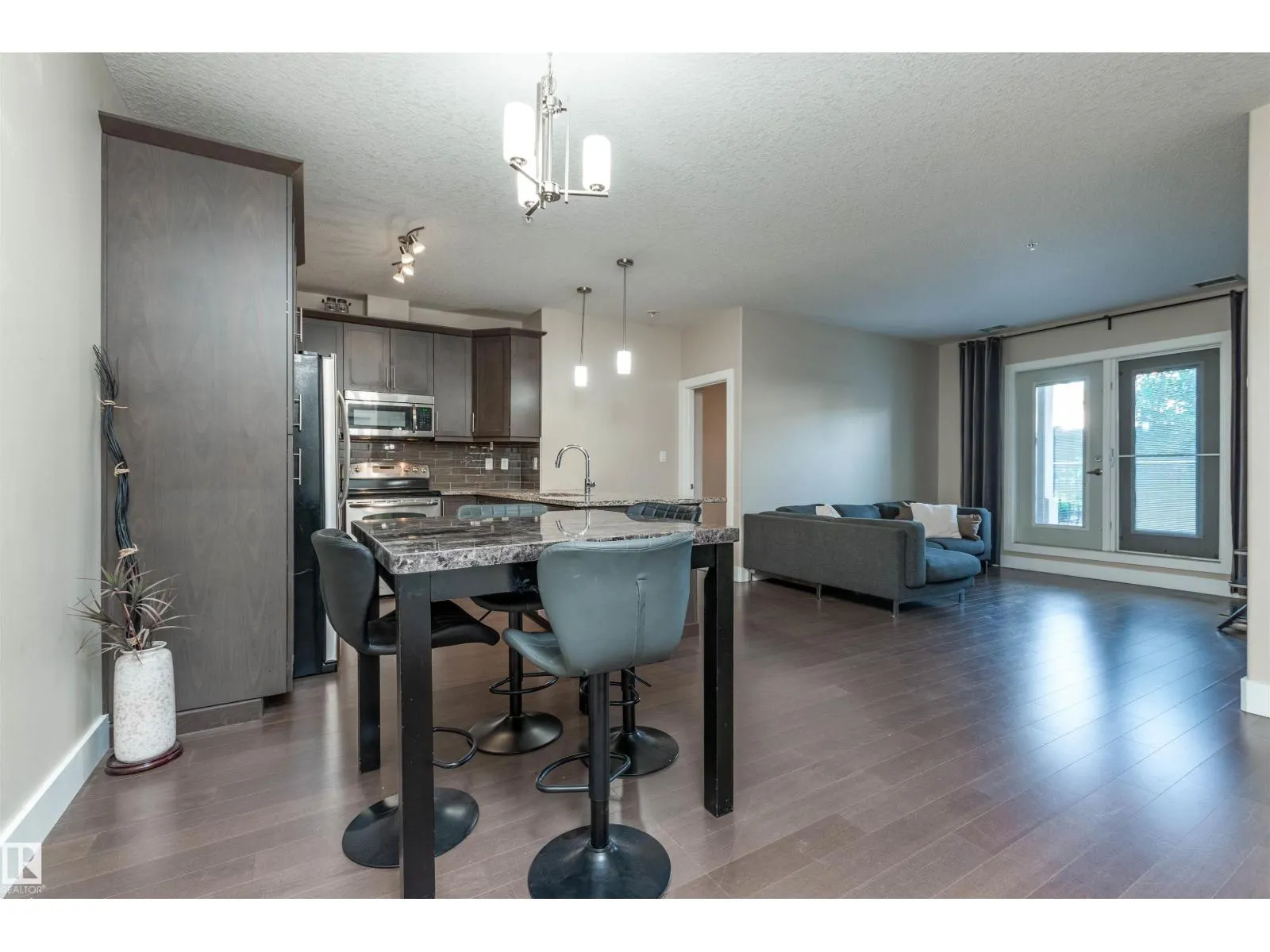 #140 6079 MAYNARD WY NW