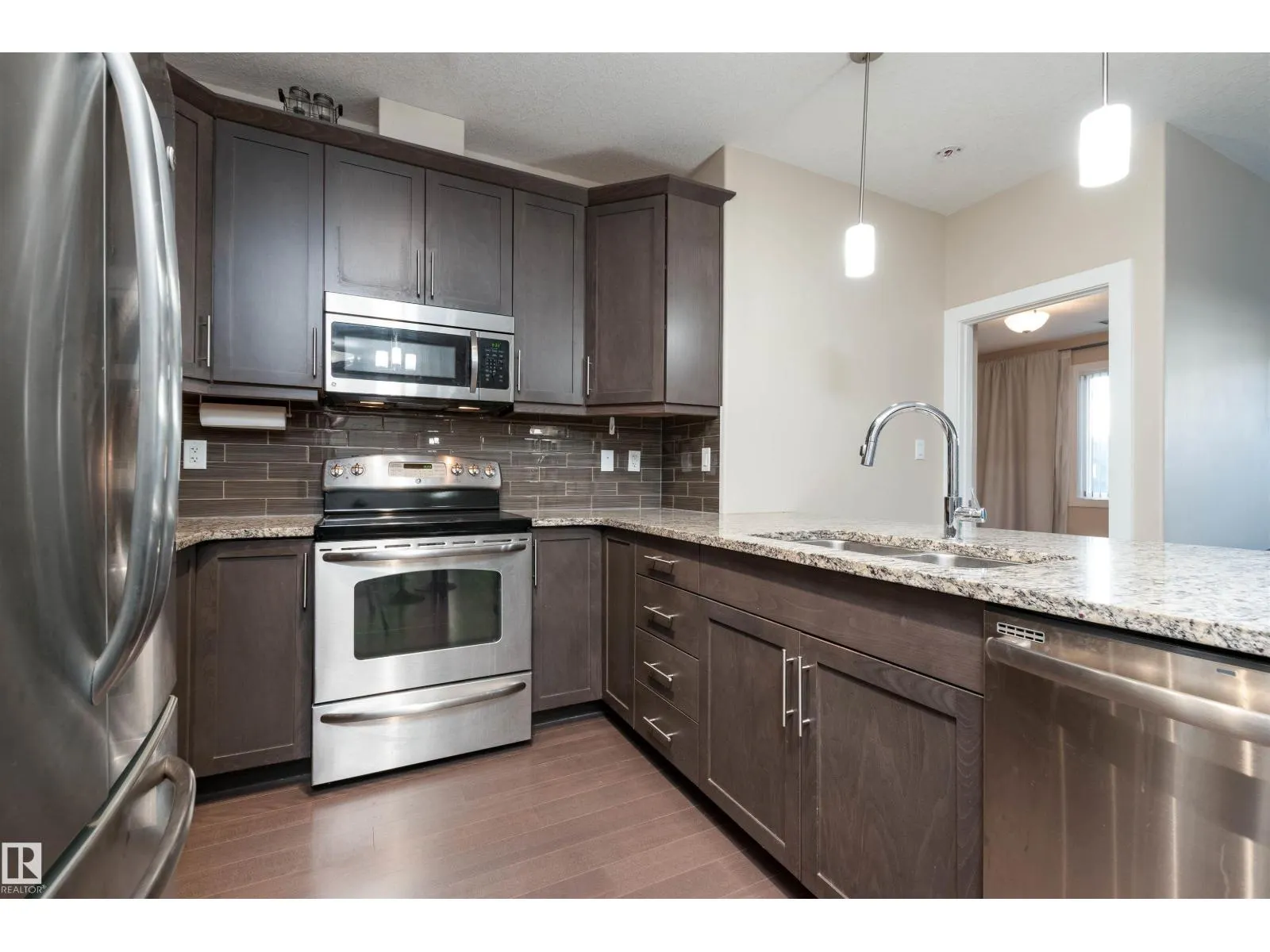 #140 6079 MAYNARD WY NW