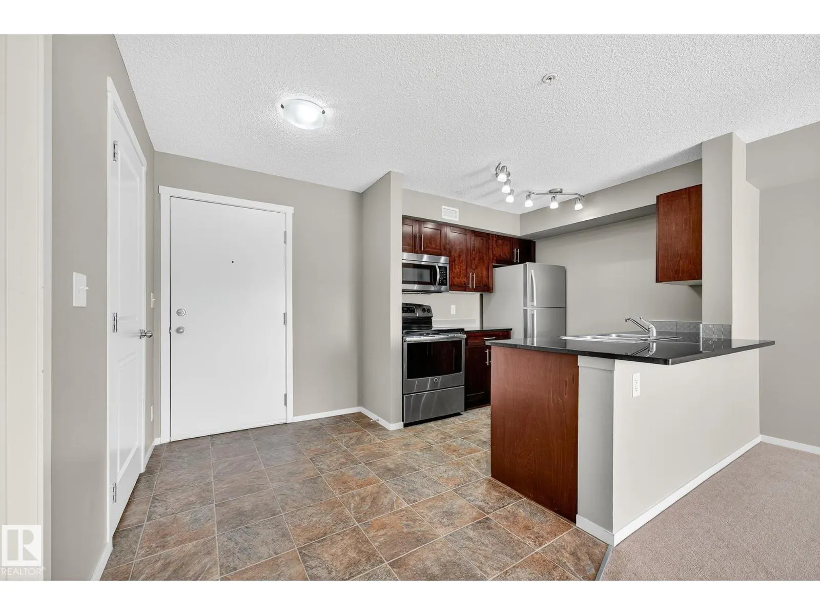 #204 5810 MULLEN PL NW