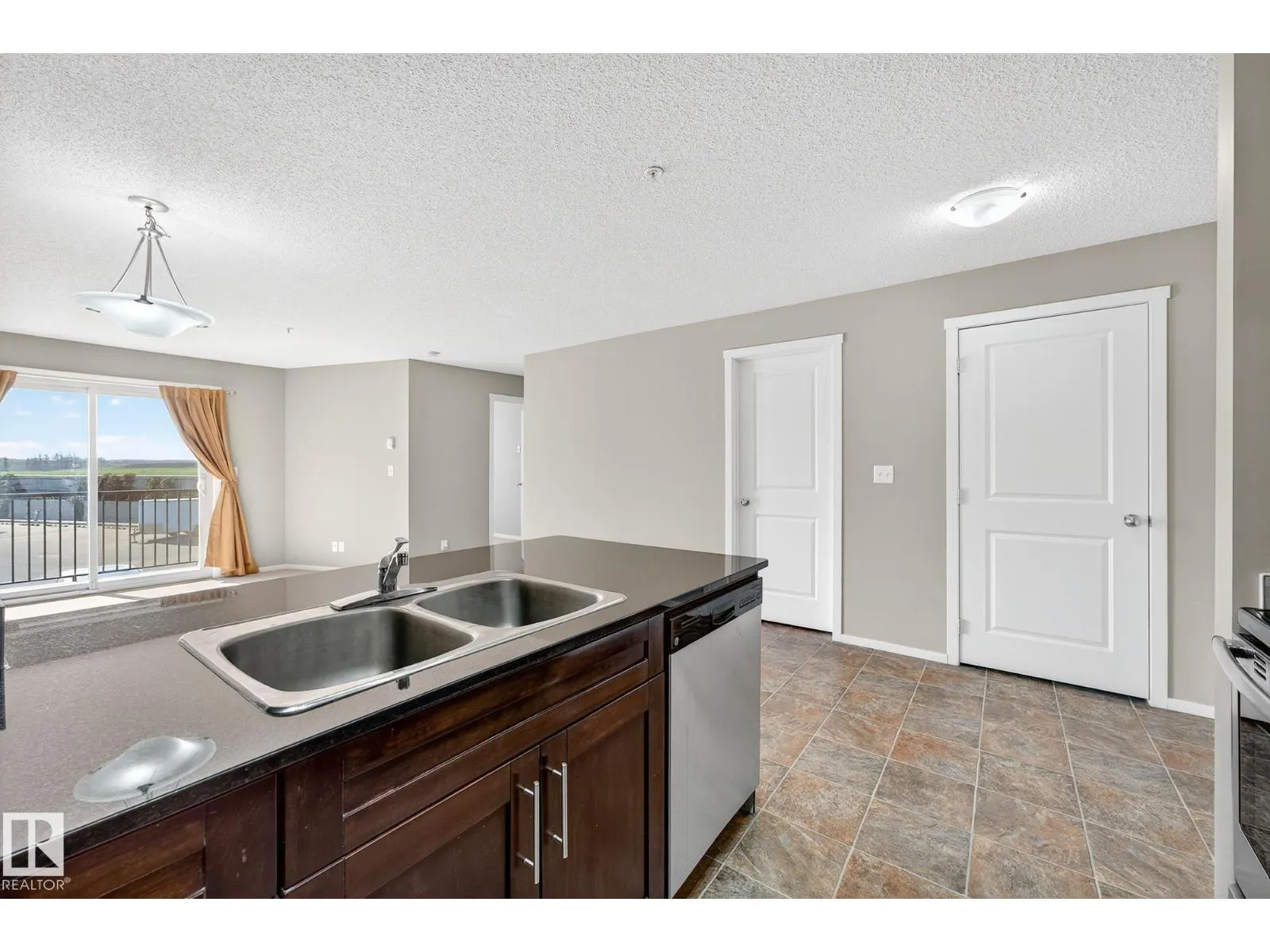 #204 5810 MULLEN PL NW
