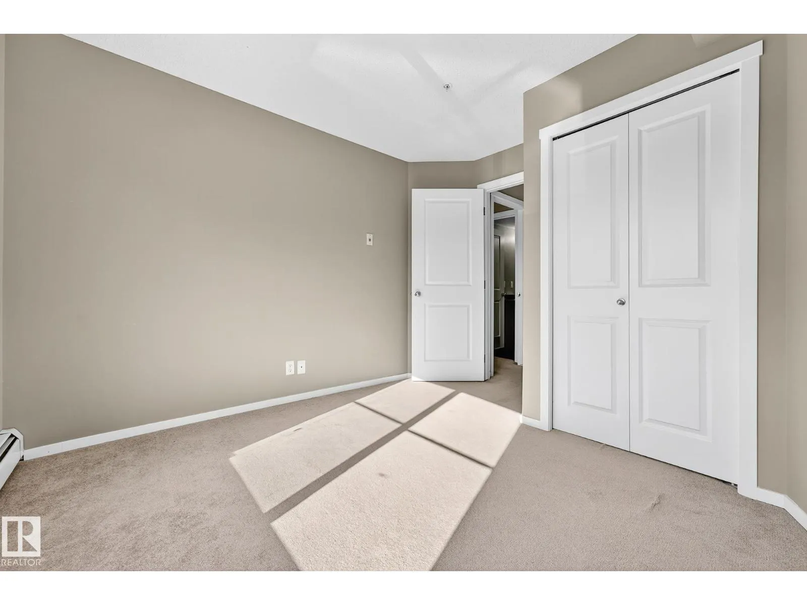 #204 5810 MULLEN PL NW