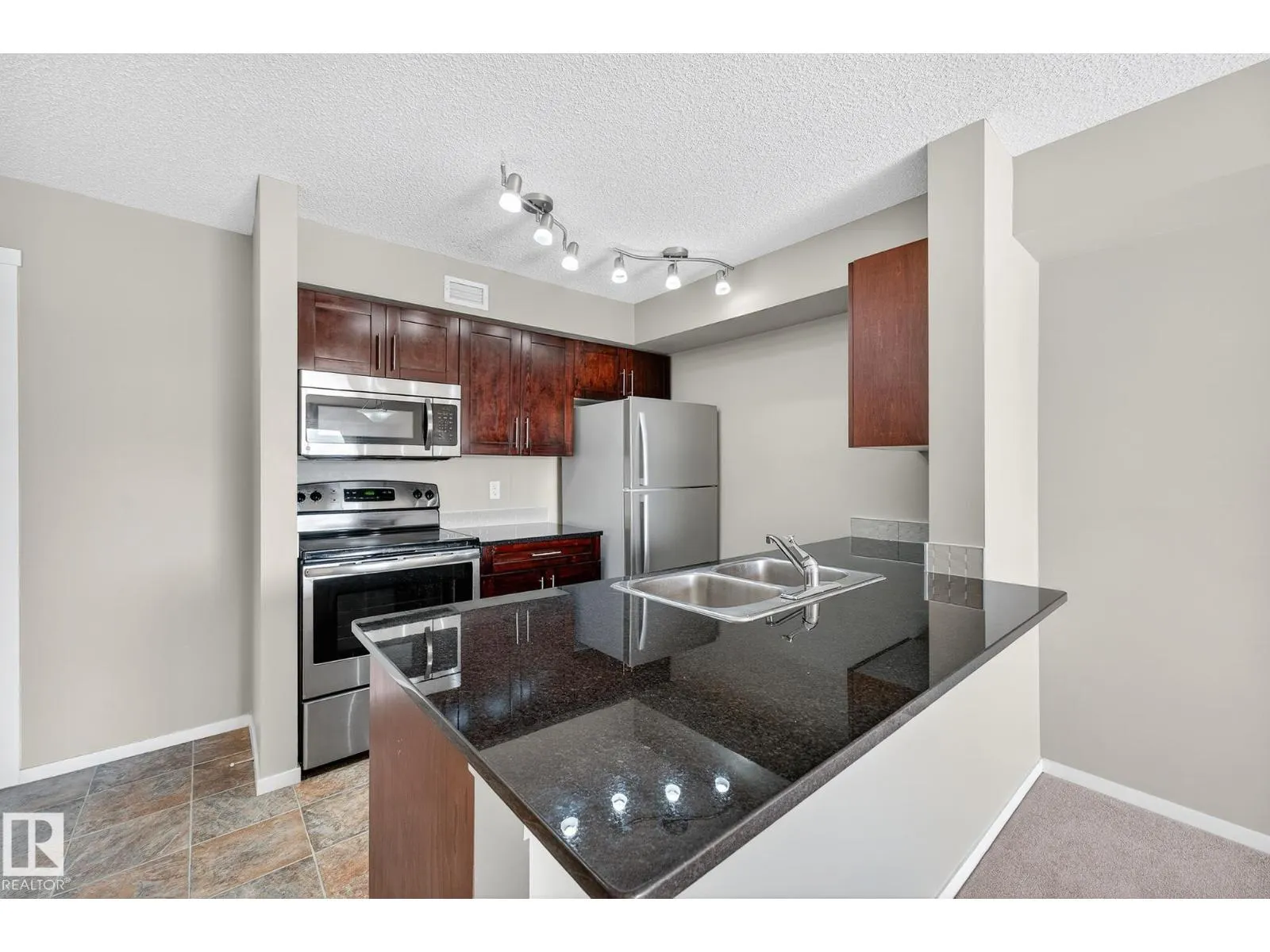 #204 5810 MULLEN PL NW