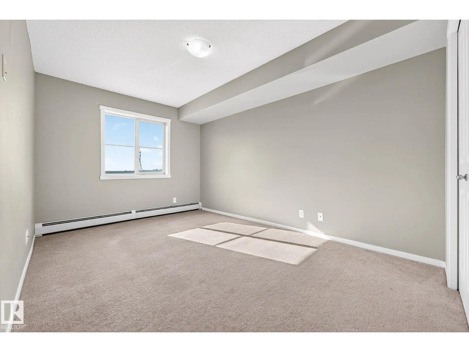 #204 5810 MULLEN PL NW