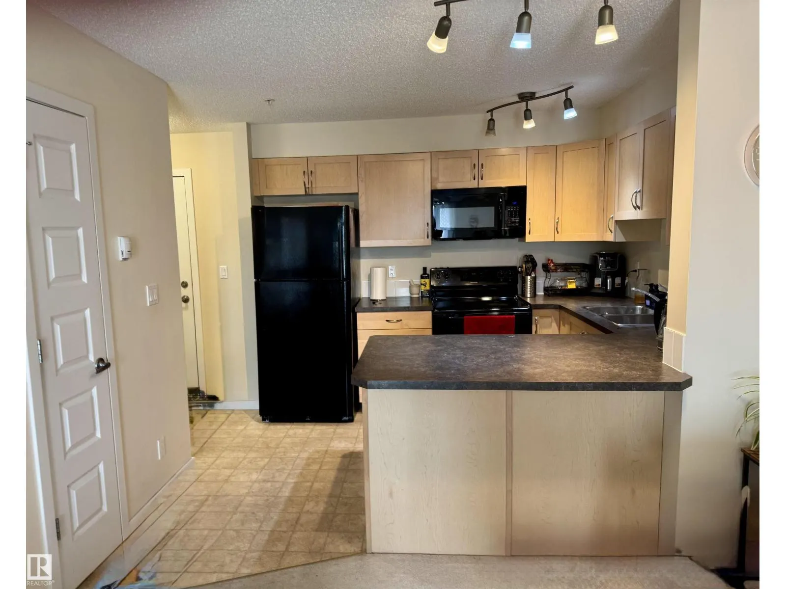 #213 400 SILVER BERRY RD NW