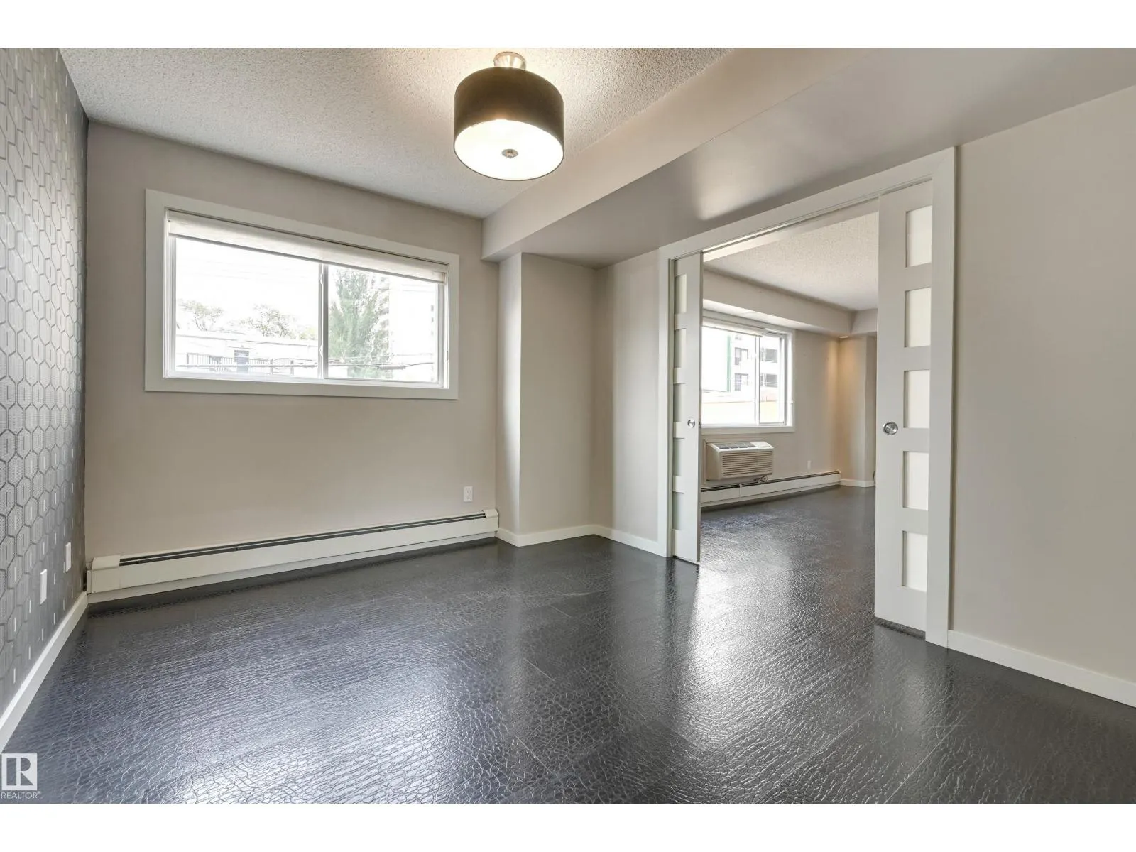 #104 10140 115 ST NW