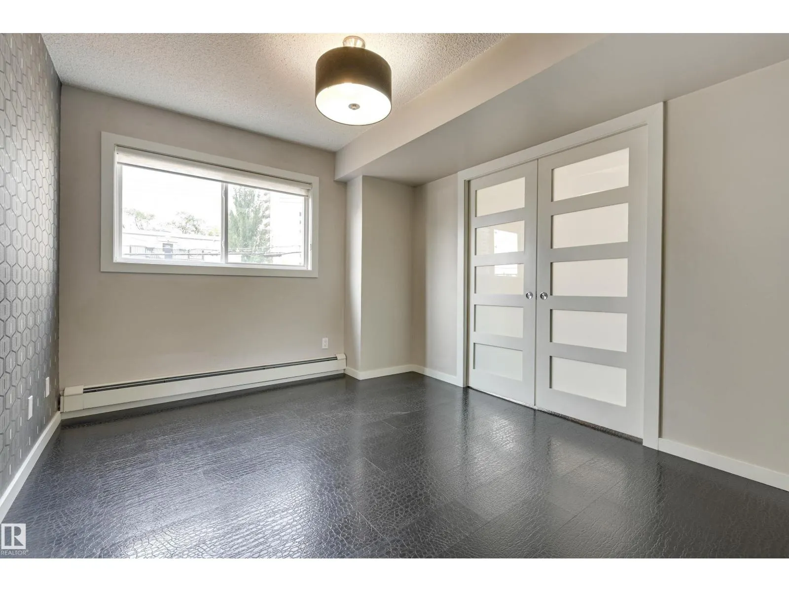 #104 10140 115 ST NW
