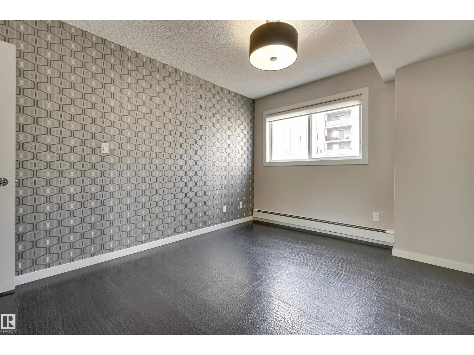#104 10140 115 ST NW