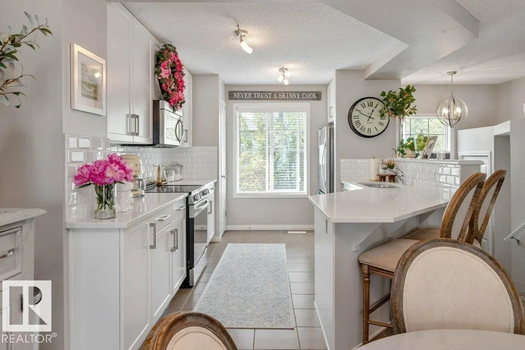 #41 7385 EDGEMONT WY NW