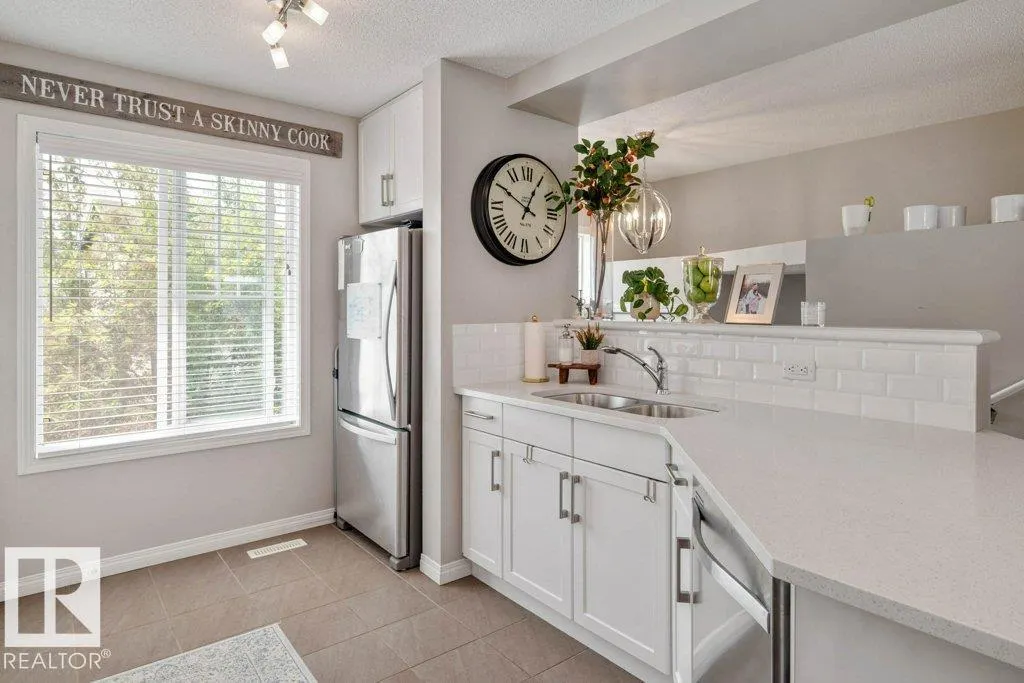 #41 7385 EDGEMONT WY NW