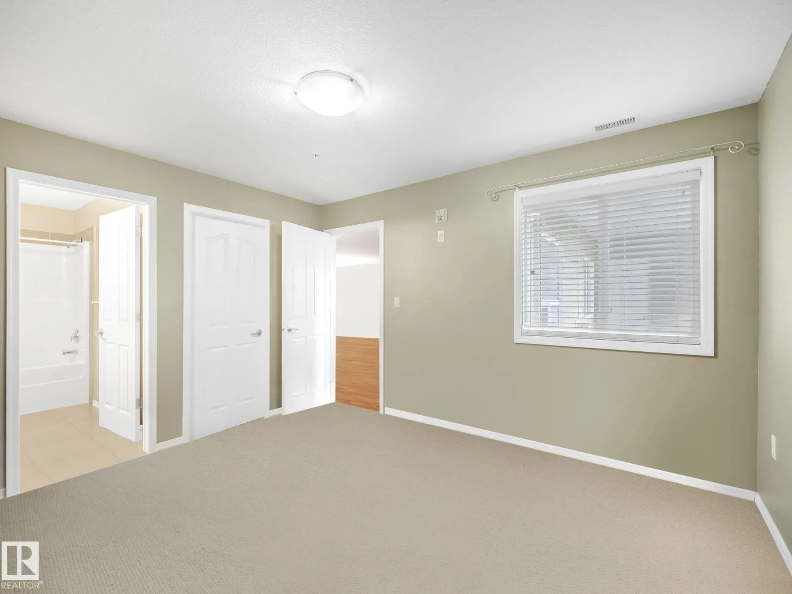#103 1320 RUTHERFORD RD SW