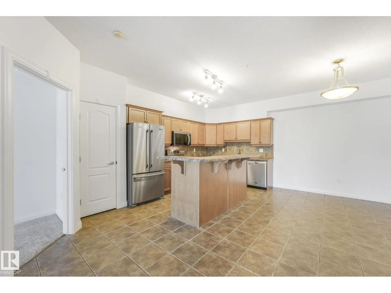 #232 1406 HODGSON WY NW